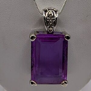 Neodymium Very Large Color changing neodymium dichroic glass pendant.